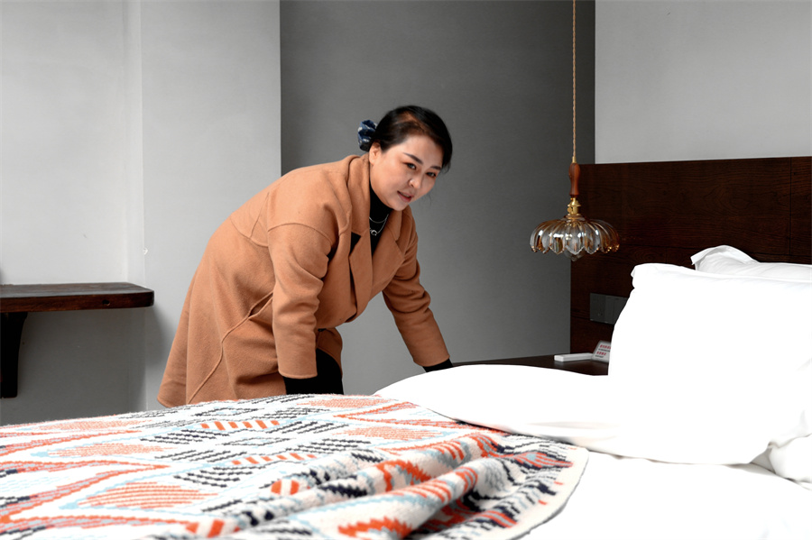 溪谷九渡民宿管家杨德芳 高文亚摄 (14).jpg